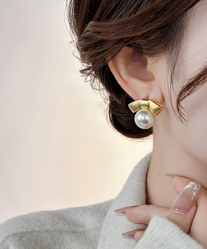 Gold Alloy Pearl Bow Stud Earrings
