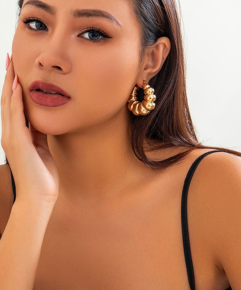 Gold Metal Alloy Fried Dough Twist Croissant Hoop Earrings