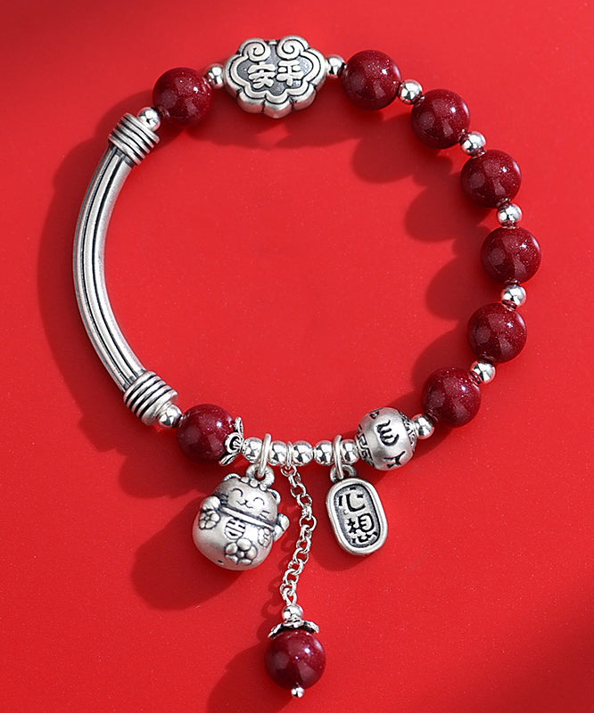 Mulberry Sterling Silver Cinnabar Tassel Charm Bracelet Kx1048
