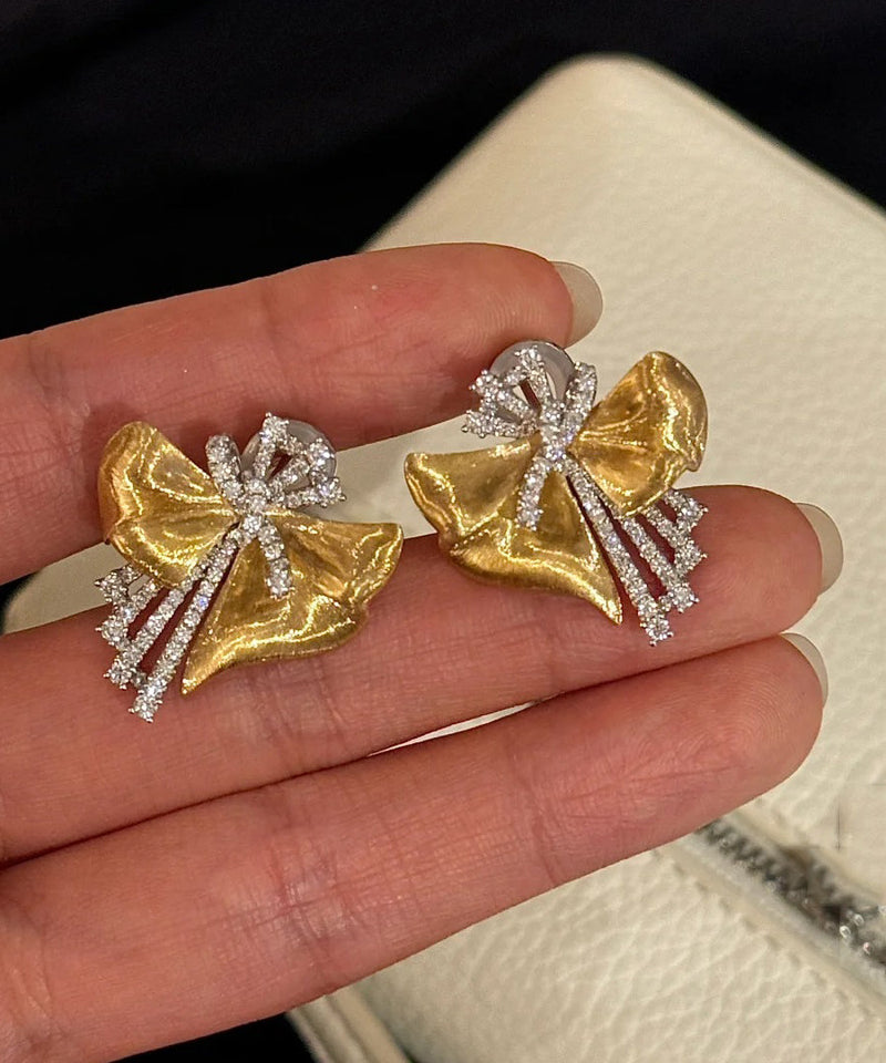 Gold Alloy Asymmetrical Bow Zircon Silk Stud Earrings
