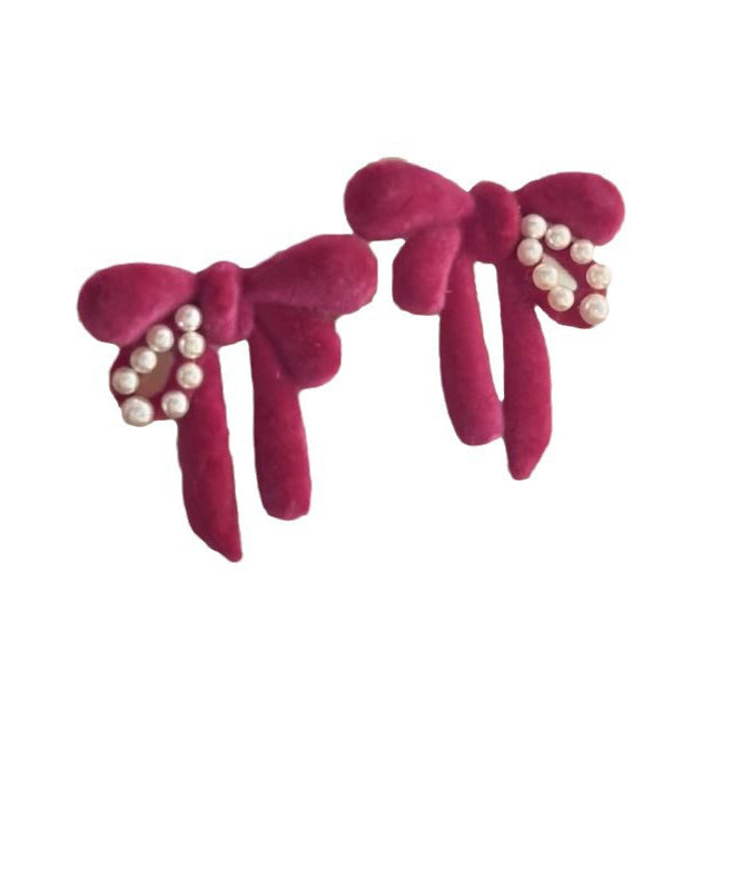 Raspberry Powder Sterling Silver Flocking Pearl Bow Stud Earrings