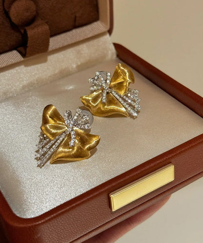 Gold Alloy Asymmetrical Bow Zircon Silk Stud Earrings