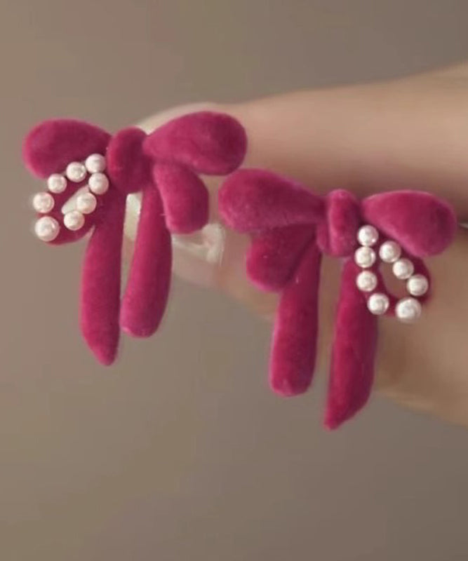 Raspberry Powder Sterling Silver Flocking Pearl Bow Stud Earrings