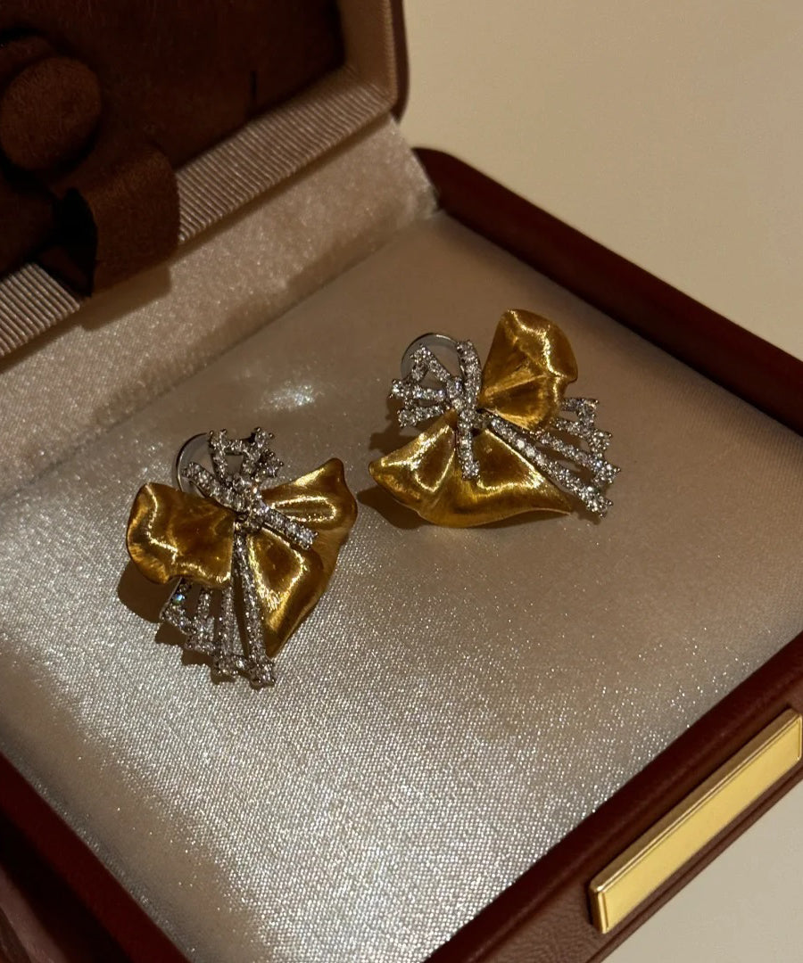Gold Alloy Asymmetrical Bow Zircon Silk Stud Earrings