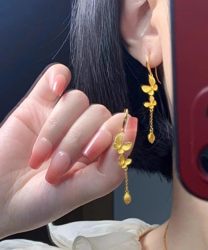Gold Alloy Bow Tassel Drop Earrings