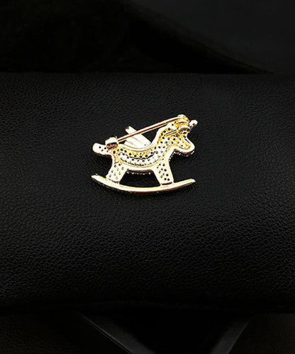 Gold Zircon Unicorn Brooches