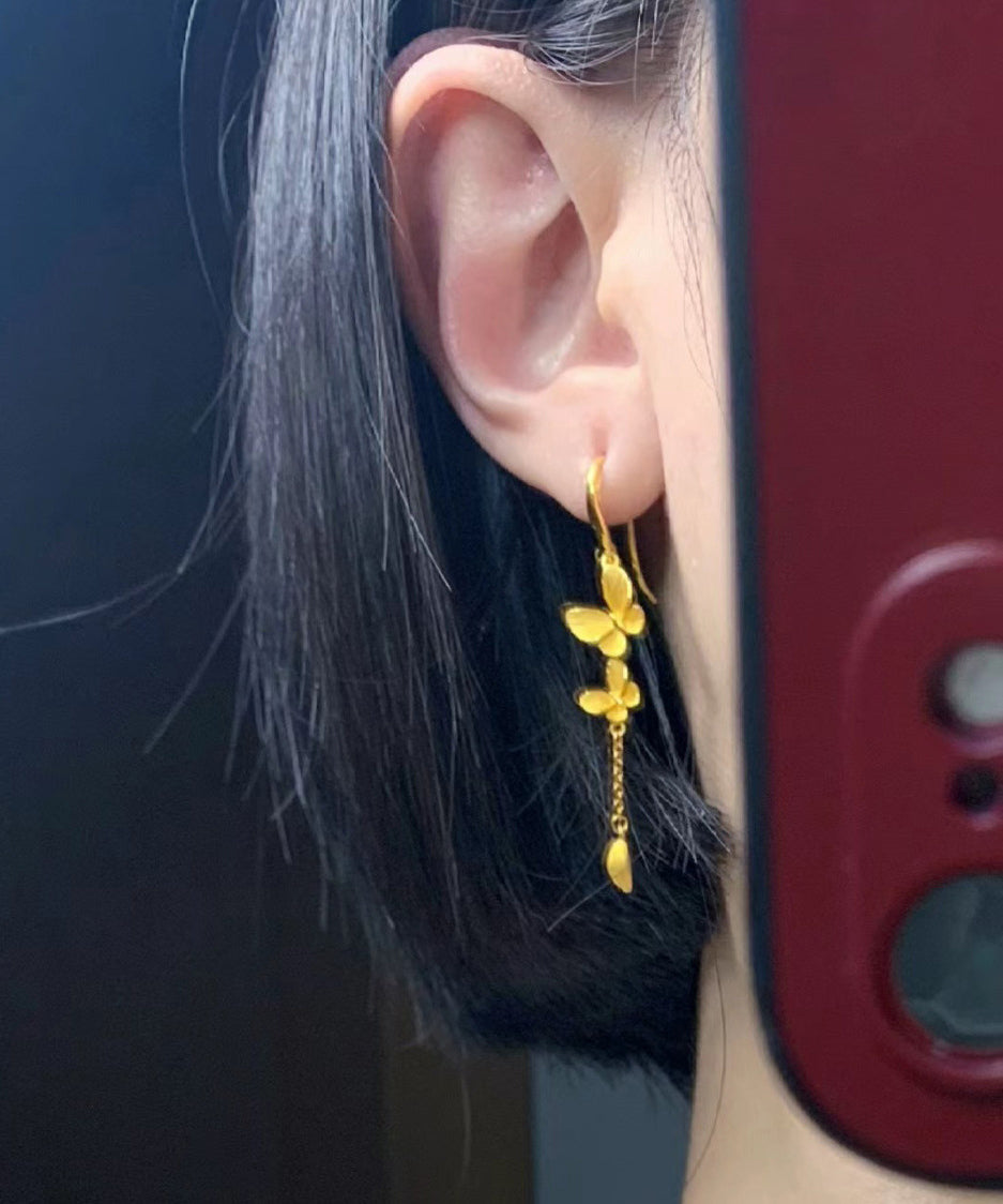 Gold Alloy Bow Tassel Drop Earrings