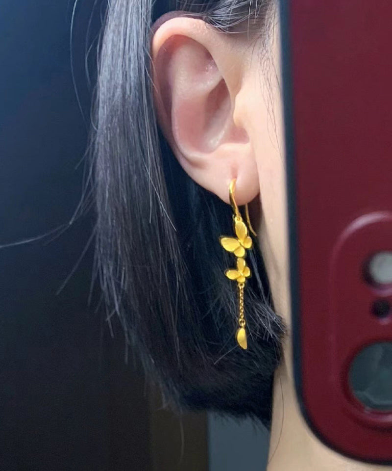 Gold Alloy Bow Tassel Drop Earrings