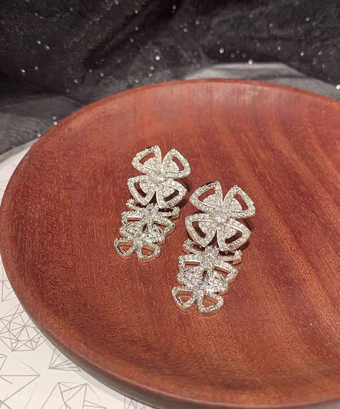 White Stainless Steel Zircon Hollow Out Bow Stud Earrings