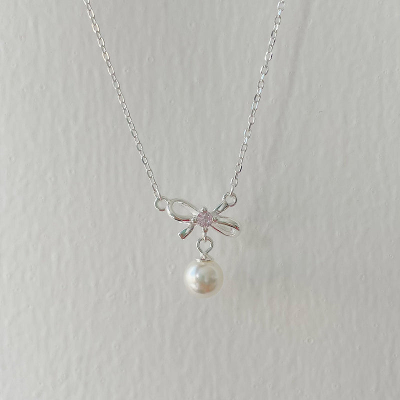 Cady Bow and Pearl Necklace