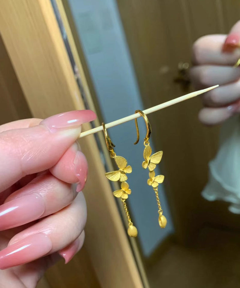 Gold Alloy Bow Tassel Drop Earrings