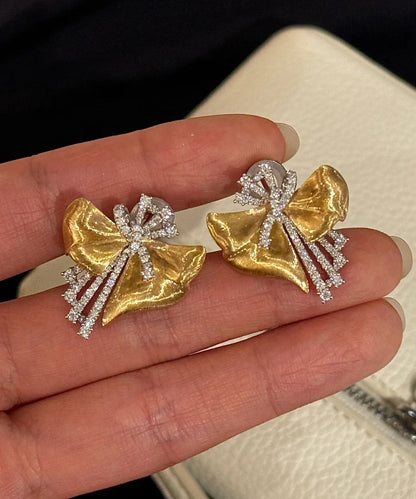 Gold Copper Zircon Asymmetrical Bow Stud Earrings